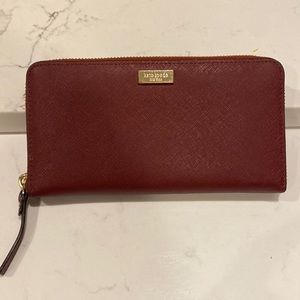 Kate Spade Laurel Way Burgundy Wallet - zip around in great used condition.